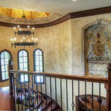 European plaster walls with wood glazed trim custom ceiling mural and marble mural crest